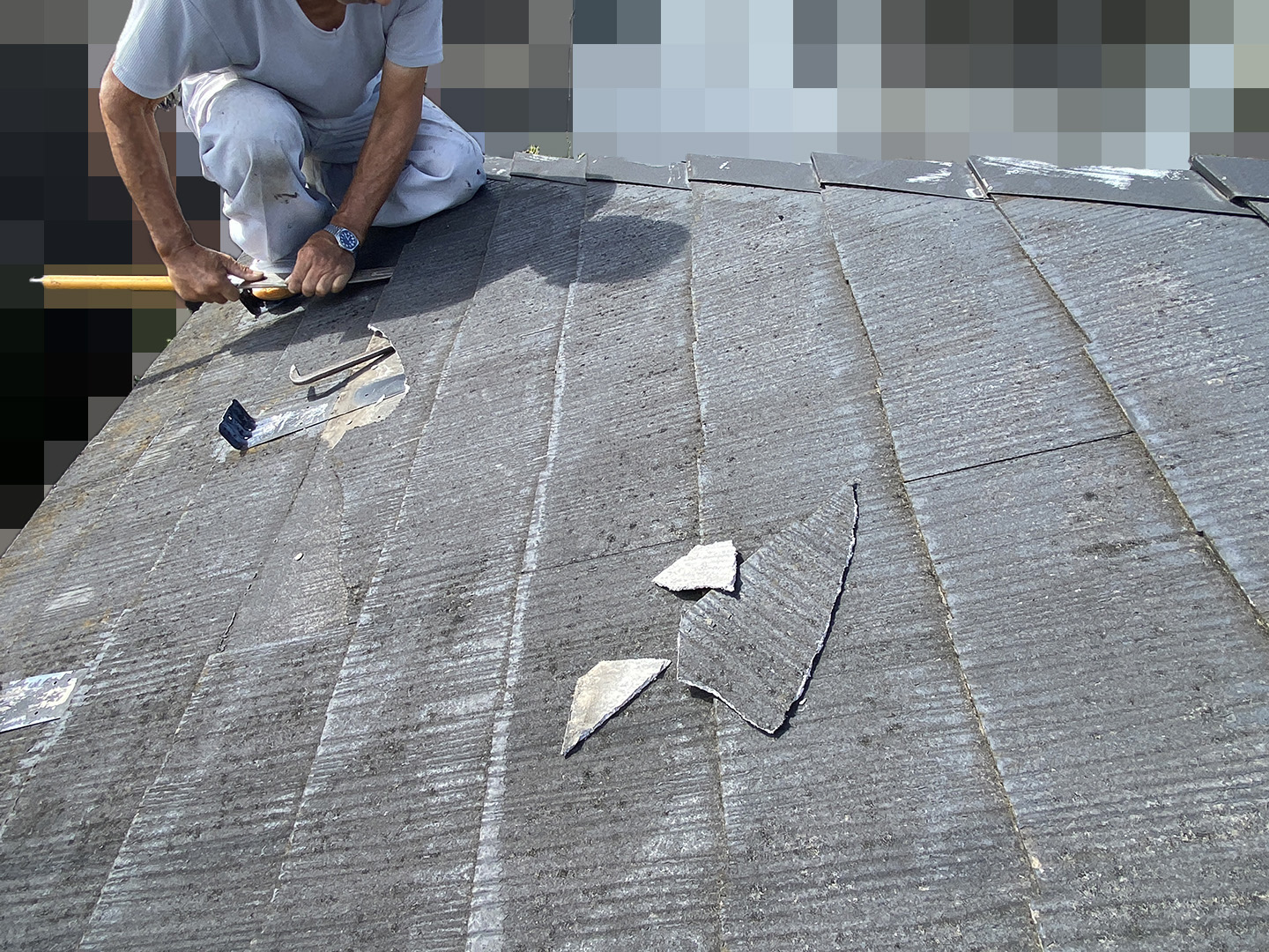 屋根材の補修工事（西面）